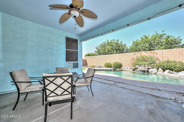 11580 N 86th Ln, Peoria, AZ 85345 - fenced backyard with ceiling fan, outdoor dining area, and a patio