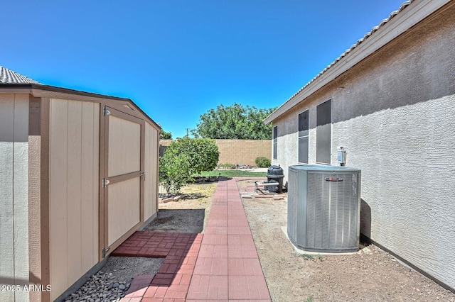 11580 N 86th Ln, Peoria, AZ 85345 - fenced backyard with a storage unit