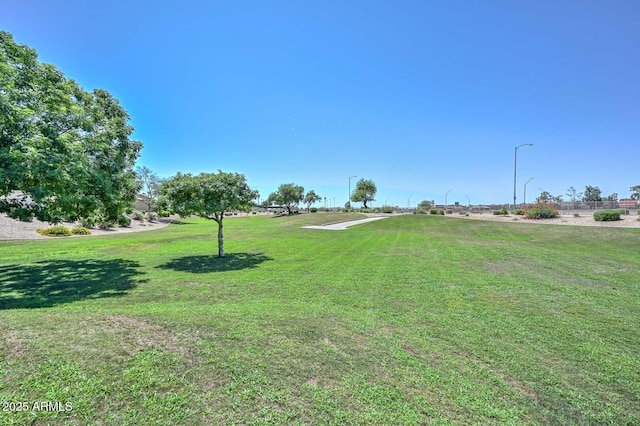 11580 N 86th Ln, Peoria, AZ 85345 - view of home's community featuring a lawn