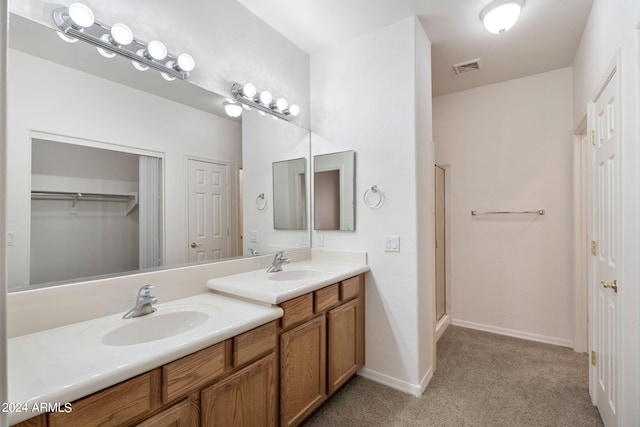 bathroom featuring vanity and walk in shower