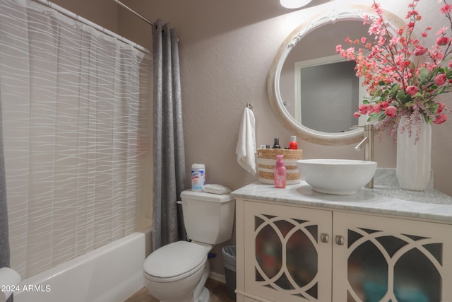 full bathroom featuring vanity, toilet, and shower / bathtub combination with curtain