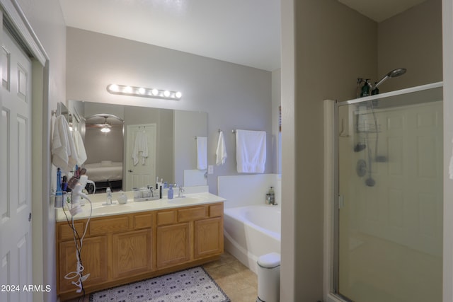 bathroom with vanity, separate shower and tub, ceiling fan, and tile patterned floors