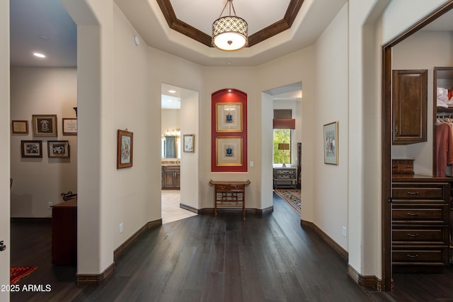 26156 N 88th Way, Scottsdale, AZ 85255 - corridor featuring dark wood finished floors, a chandelier, a tray ceiling, baseboards, and recessed lighting