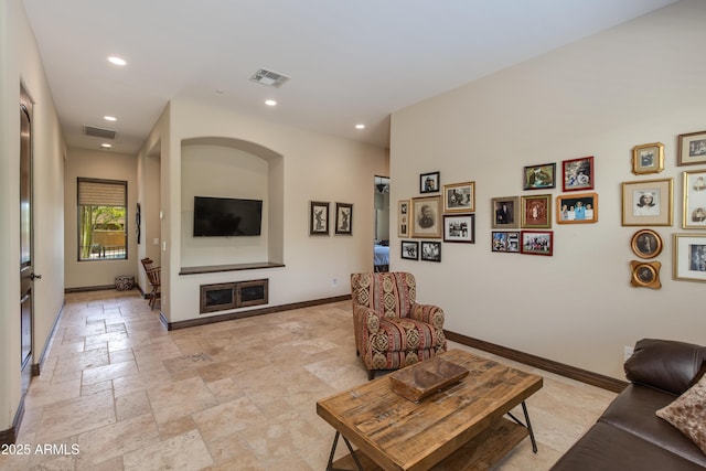26156 N 88th Way, Scottsdale, AZ 85255 - living area featuring stone tile floors, baseboards, and recessed lighting