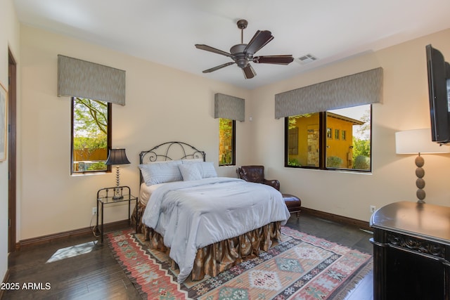 26156 N 88th Way, Scottsdale, AZ 85255 - bedroom with baseboards, wood-type flooring, and ceiling fan