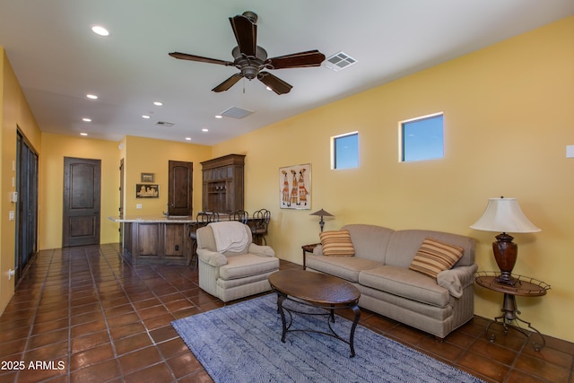 26156 N 88th Way, Scottsdale, AZ 85255 - living area featuring dark tile patterned flooring, a ceiling fan, and recessed lighting