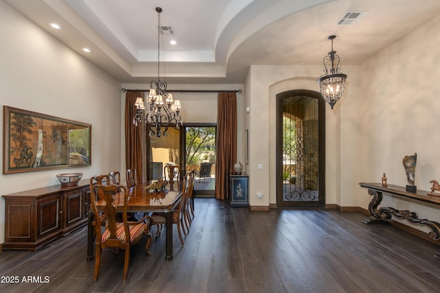 26156 N 88th Way, Scottsdale, AZ 85255 - dining space featuring a chandelier, arched walkways, dark wood-style flooring, baseboards, and recessed lighting