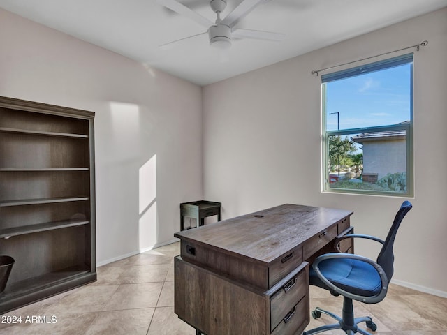 office space with ceiling fan and light tile patterned floors