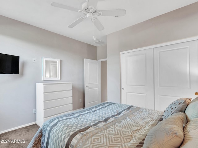 bedroom with carpet, a closet, and ceiling fan