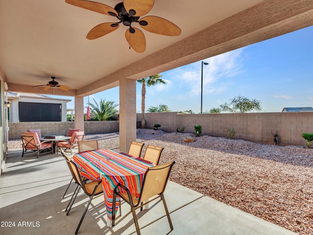 view of patio with ceiling fan