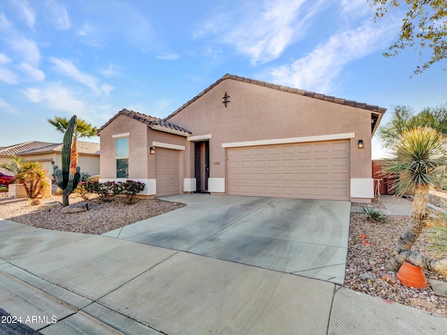 view of front of home with a garage