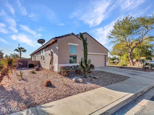 view of home's exterior featuring a garage