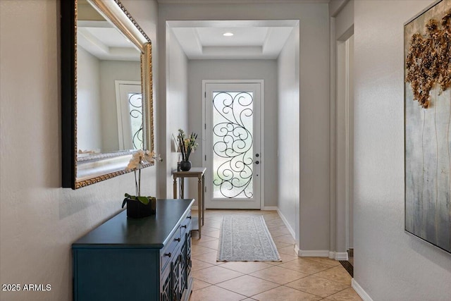 6788 S Jacqueline Way, Gilbert, AZ 85298 - doorway to outside featuring a raised ceiling, baseboards, and light tile patterned flooring