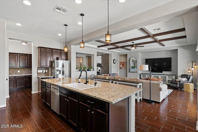 6788 S Jacqueline Way, Gilbert, AZ 85298 - kitchen with a sink, open floor plan, visible vents, and stainless steel appliances
