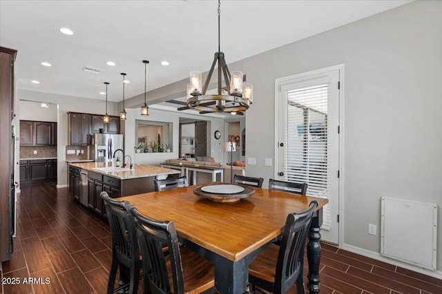 6788 S Jacqueline Way, Gilbert, AZ 85298 - dining space featuring recessed lighting, a notable chandelier, baseboards, and wood finish floors