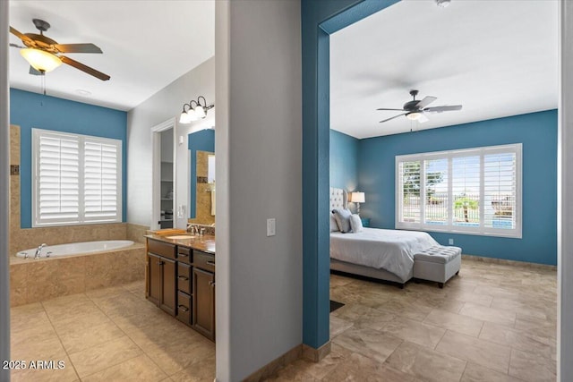6788 S Jacqueline Way, Gilbert, AZ 85298 - bedroom featuring a sink, light tile patterned floors, baseboards, and a ceiling fan