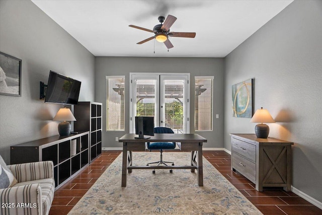6788 S Jacqueline Way, Gilbert, AZ 85298 - office area featuring french doors, baseboards, a ceiling fan, and wood finish floors