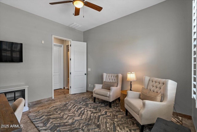 6788 S Jacqueline Way, Gilbert, AZ 85298 - living area with visible vents, baseboards, and ceiling fan