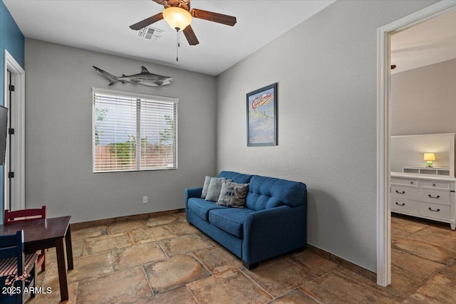 6788 S Jacqueline Way, Gilbert, AZ 85298 - sitting room with stone tile floors, visible vents, a ceiling fan, and baseboards