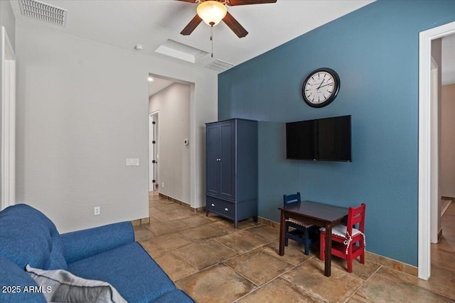 6788 S Jacqueline Way, Gilbert, AZ 85298 - living room featuring visible vents, ceiling fan, stone finish floor, and baseboards