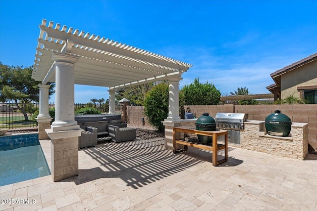 6788 S Jacqueline Way, Gilbert, AZ 85298 - view of patio with a pergola, a fenced backyard, grilling area, an outdoor kitchen, and a hot tub