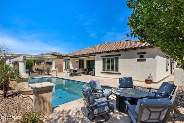 6788 S Jacqueline Way, Gilbert, AZ 85298 - back of property featuring a fenced in pool, a tiled roof, a pergola, a patio area, and outdoor dining area