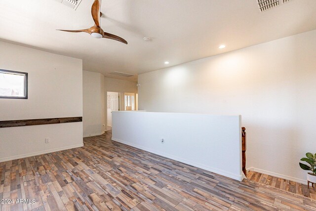 kitchen featuring decorative light fixtures, beverage cooler, stainless steel appliances, and plenty of natural light