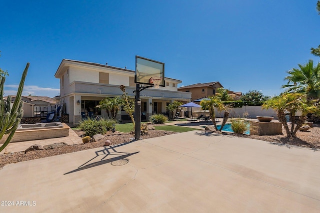 exterior space with a patio area and fence