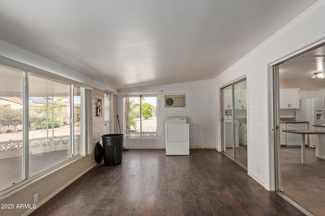 unfurnished sunroom with washer / dryer