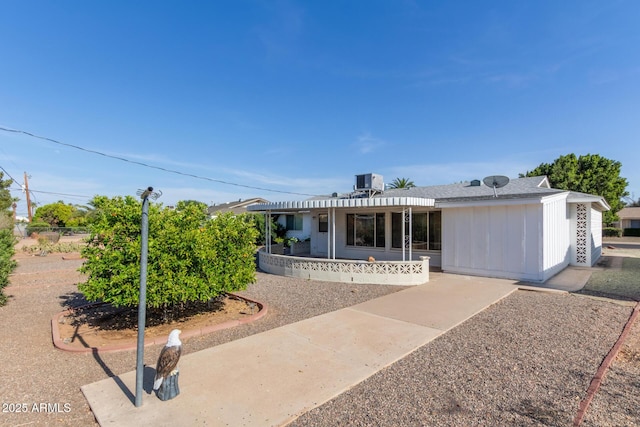 rear view of house featuring a patio area