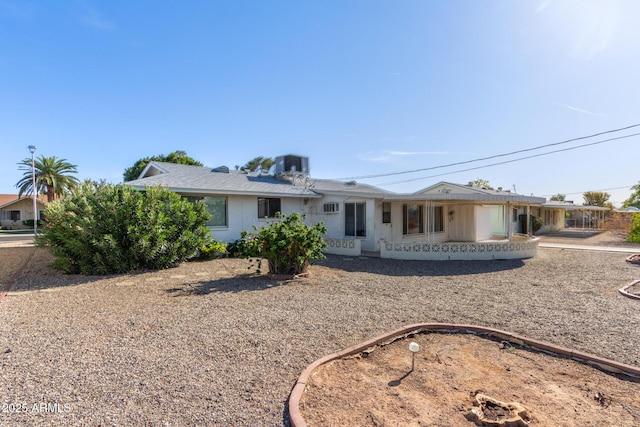 view of front of property featuring central AC unit