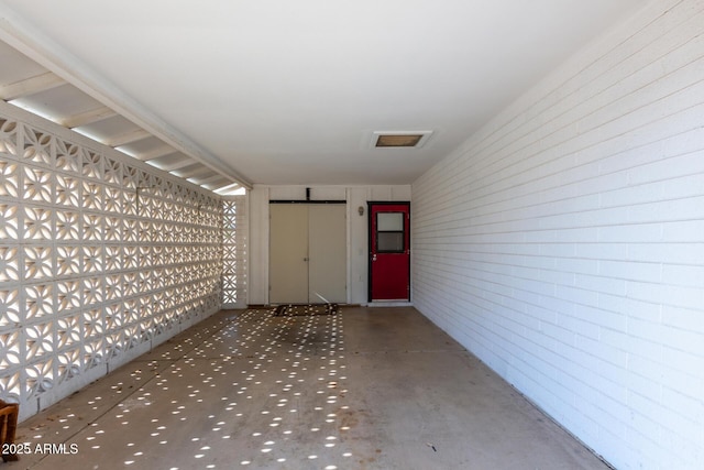 view of exterior entry with visible vents