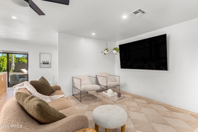 living room featuring ceiling fan