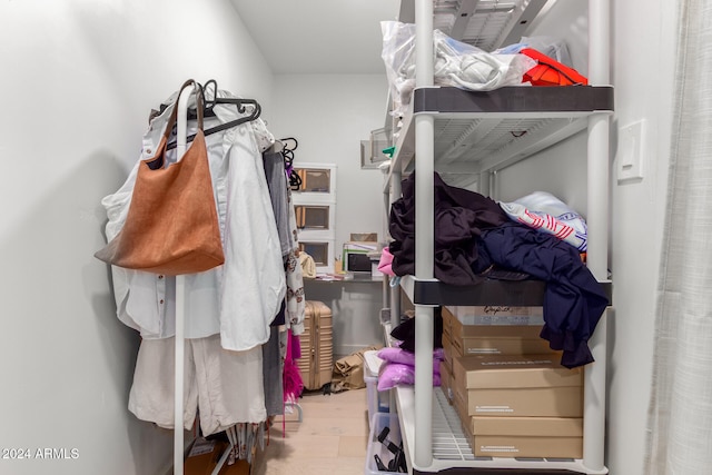 walk in closet featuring light hardwood / wood-style floors