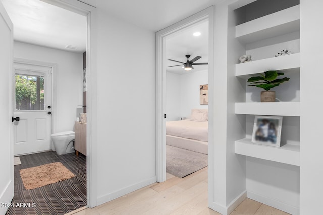 corridor featuring light hardwood / wood-style flooring