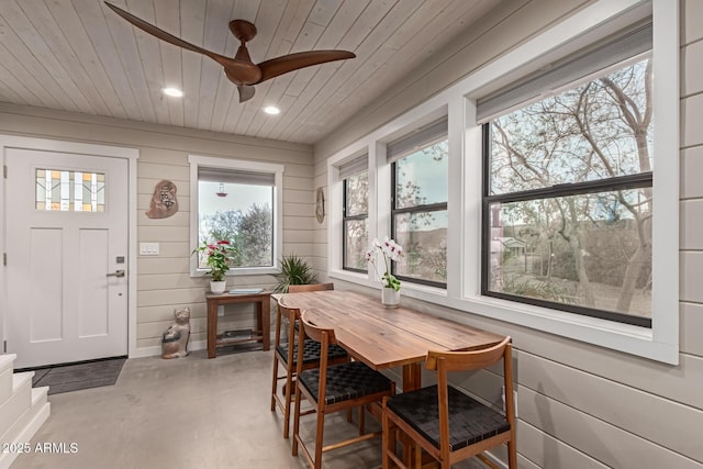 sunroom / solarium featuring wooden ceiling