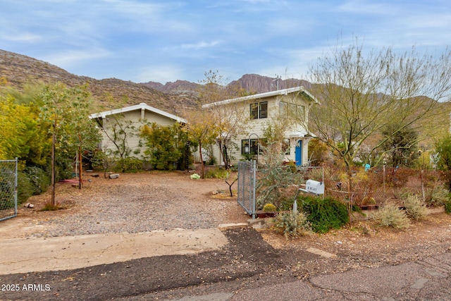 view of front of home with a mountain view