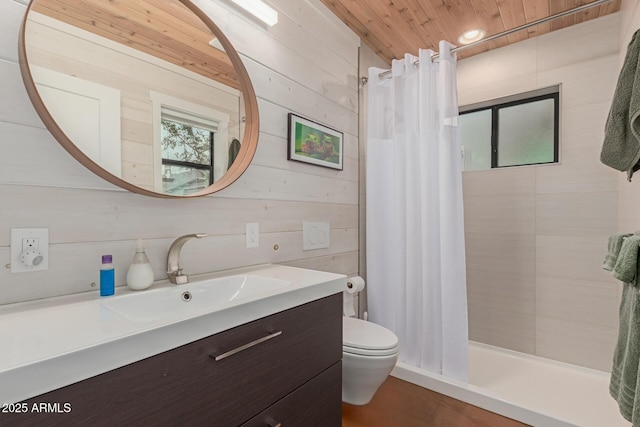 full bathroom with shower / bath combo, vanity, wooden ceiling, toilet, and wood walls