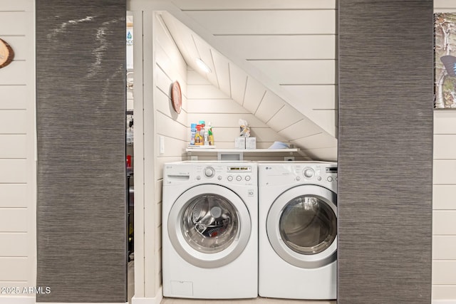 laundry room with separate washer and dryer