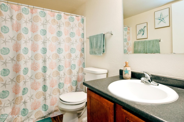 full bath with vanity, a shower with curtain, and toilet