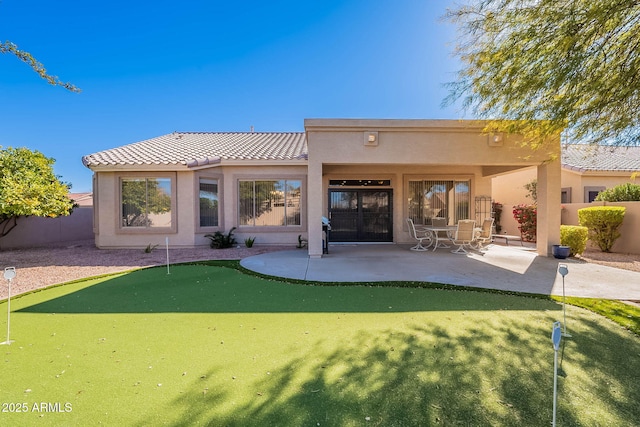 rear view of property with a patio area