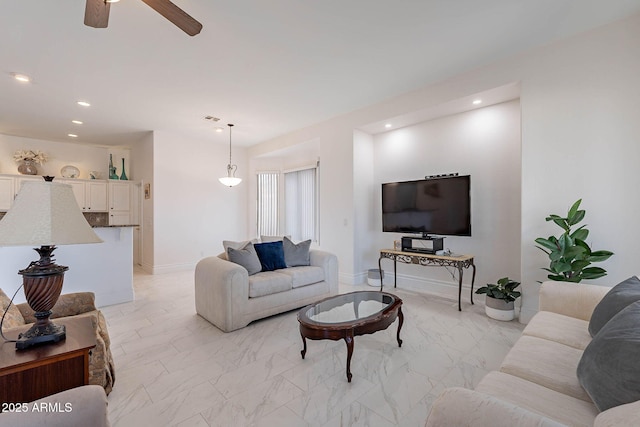 living room featuring ceiling fan