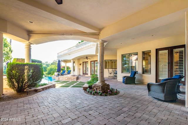 view of patio with ceiling fan