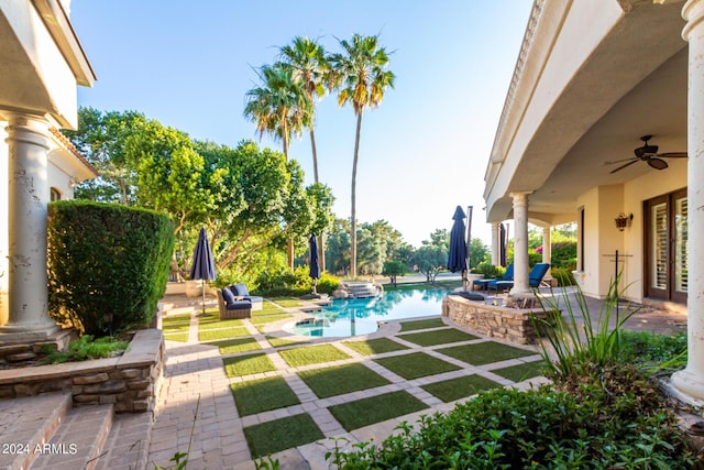 view of patio with ceiling fan