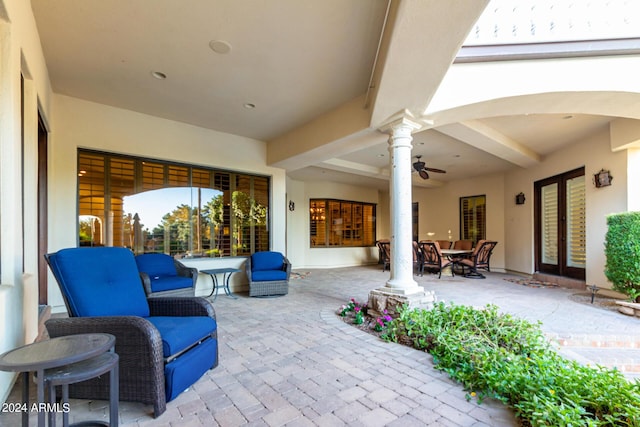 view of patio with ceiling fan and french doors