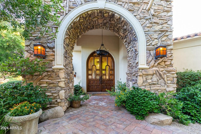 entrance to property featuring french doors