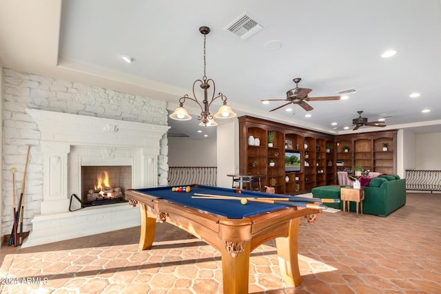 rec room with a fireplace, ceiling fan, and pool table