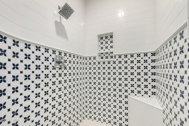 details featuring a tile shower