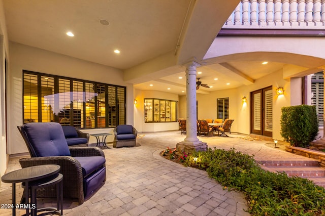 view of patio / terrace featuring ceiling fan