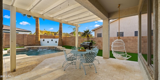 view of patio / terrace with area for grilling, a fenced in pool, and a fenced backyard